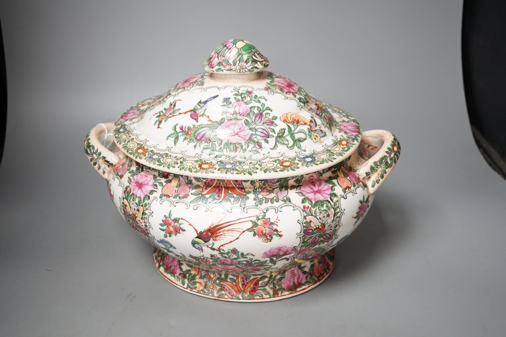 A large Chinese famille rose vase and a similar tureen and cover, vase 63 cms high.